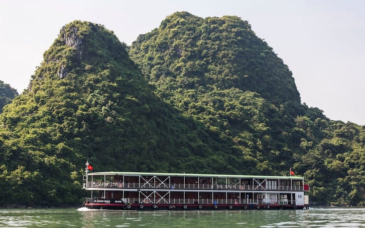 Sail through stunning landscapes from Halong Bay to Vietnam